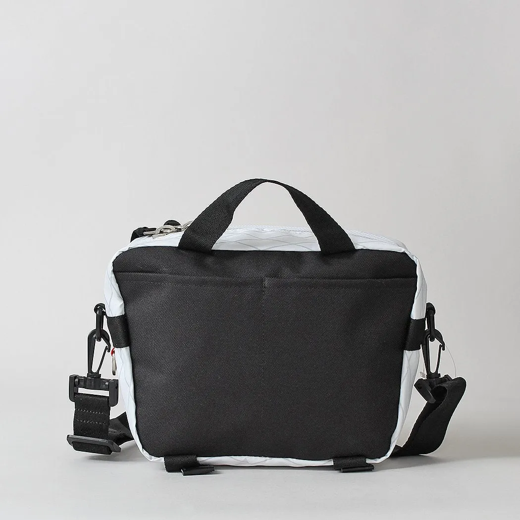 Indispensable Trip Dinky X Shoulder Bag